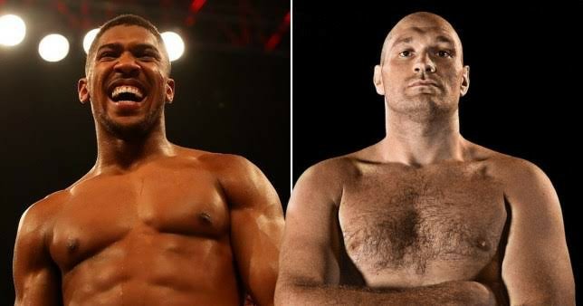 Anthony Joshua says he wants to take Tyson Fury’s ‘head off his shoulders’