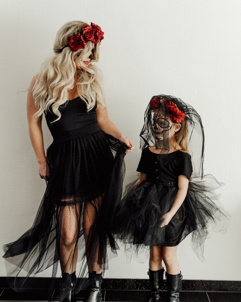 mother and daughter dressed for Halloween