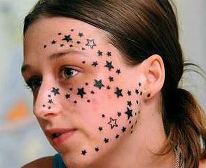 hot breast tattoo: Women tattoos star on face