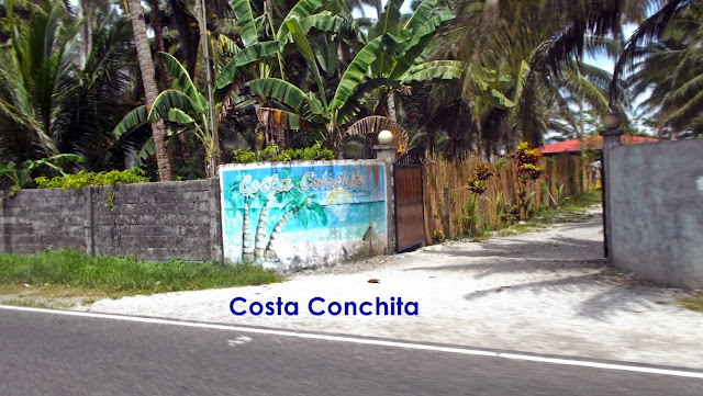 roadside view of gate/entrance to Villa Costa Conchita Resort in Buenos Aires Beach, Victoria, Northern Samar