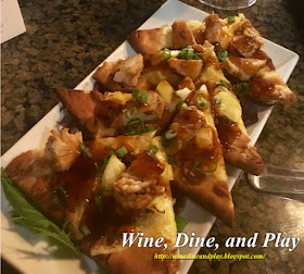 A Hawaiian flatbread with chicken, pineapple, and cheese at the Melting Pot restaurant in St Petersburg, Florida