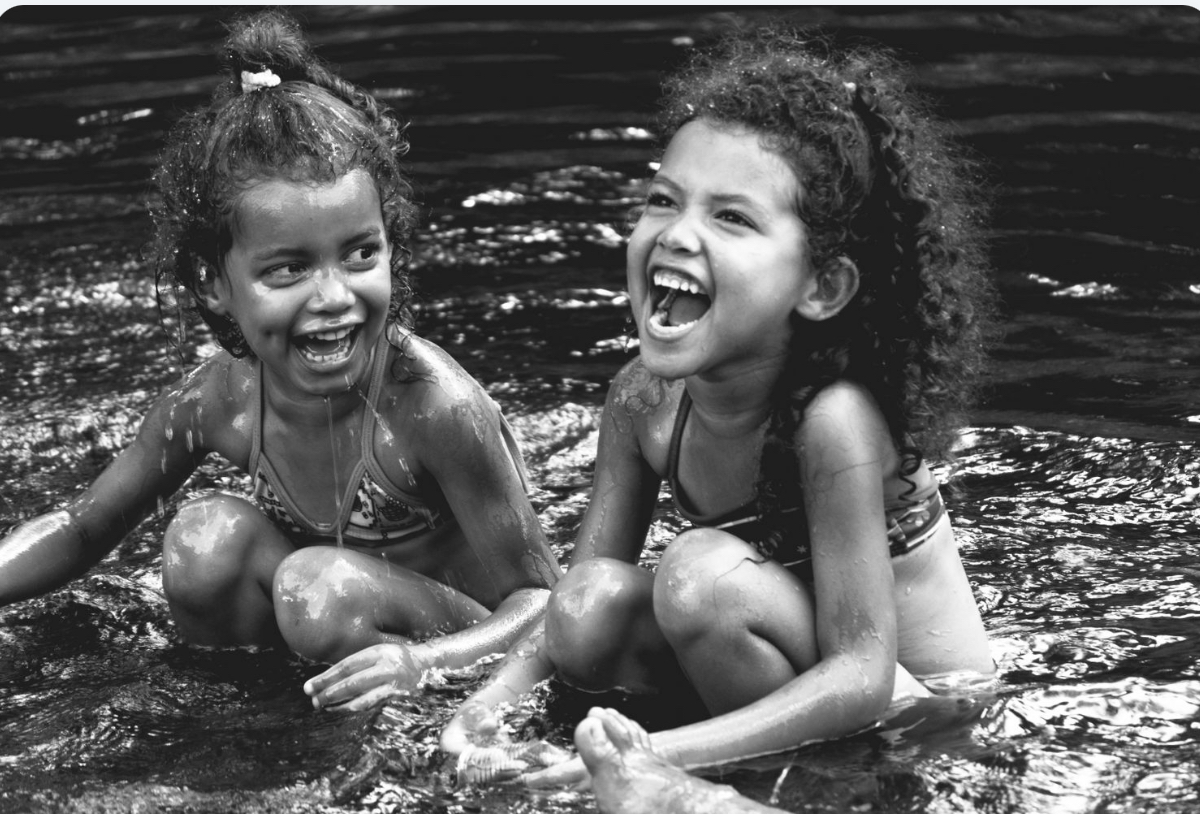 Kids laughing having fun lifestyle of beauty Lisa D’Anna