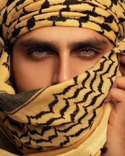 A man wearing yellow turban having yellow eyes could see in dark. Problems will be solved, just recognize Allah