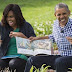 Barack & Michelle Obama make funny faces while reading a story to children