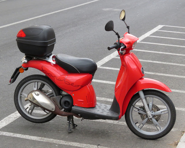 A red Scarabeo scooter, Viale del Risorgimento, Livorno