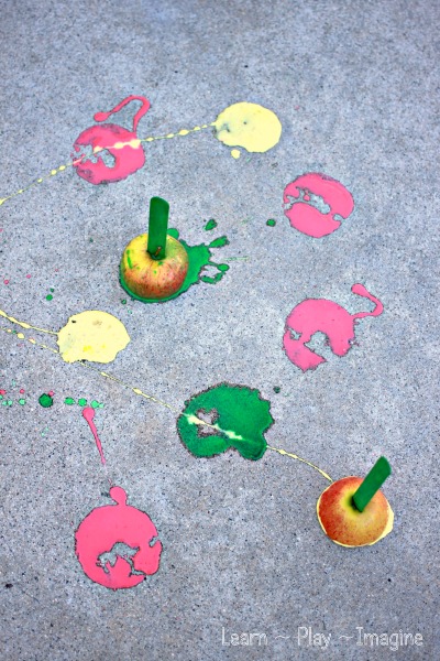 Apple printing with homemade scented sidewalk chalk paint.