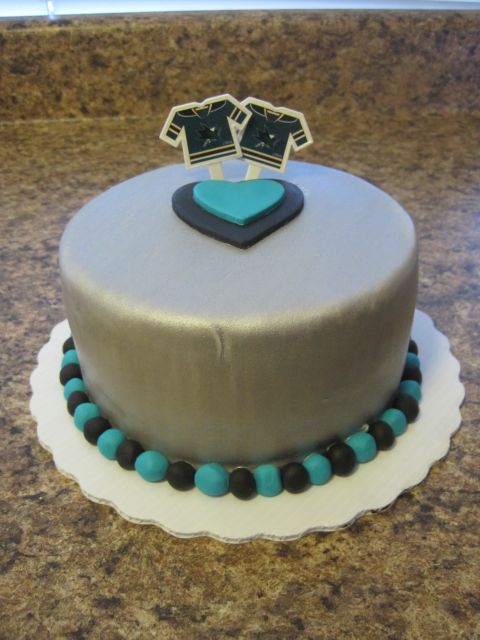 I decorated this tasting cake with some black and teal fondant 