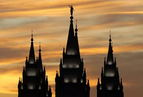 The spire of the Salt Lake City Temple of the Church of Jesus Christ of Latter-Day Saints is seen in Salt Lake City on Oct. 12, 2011. Photographer: George Frey/Bloomberg