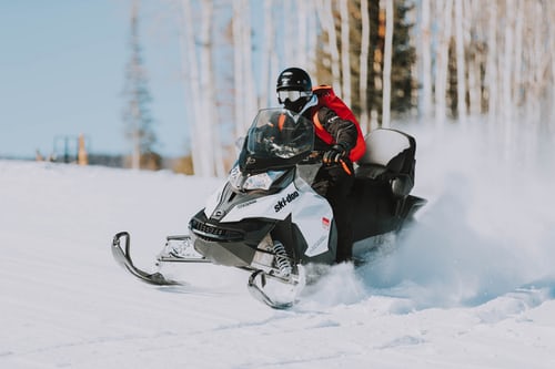 Person Snowmobiling on a Staycation