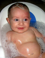 Image of A Happy Baby In A Tub: No screaming babies here