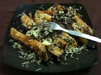  pisang berbalut kulit lumpia dan diberi gula pasir ini sangat terkenal di kota Bandung RESEP CARA MEMBUAT PISANG AROMA COKLAT KEJU