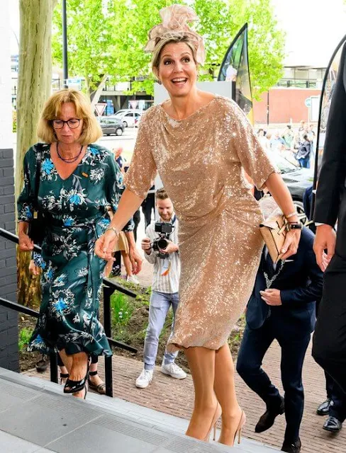 Queen Maxima wore a sequin skirt and blouse by Natan, and a hat by Fabienne Delvigne. Gianvito Rossi pumps