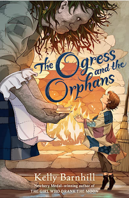 Cover of middle grade book, The Ogress and the Orphans, by Kelly Barnhill. The cover shows an ogress, with plants and flowers growing in her hair, bending down to offer food to a smiling child, who is wrapped in a patchwork blanket and standing on tiptoes to received the gift. A cozy fireplace burns in the background.