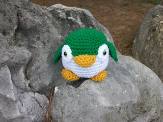 Handmade plush penguin in green