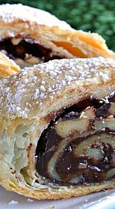 Mother's Chocolate Strudel - Just 4 ingredients: sheet of puff pastry, chocolate chips, walnuts and butter. I had no idea strudel was this easy to make! 