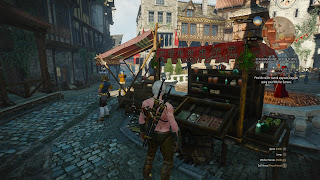 Geralt at the market of Novigrad, looking at some herbs.