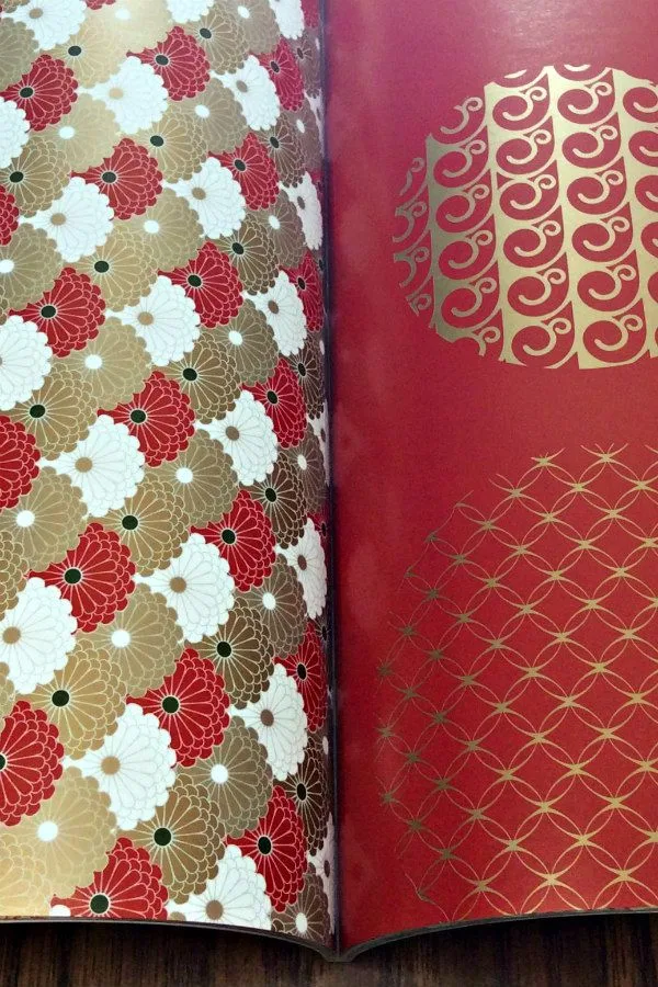 red and metallic pantone gold gift wrap papers