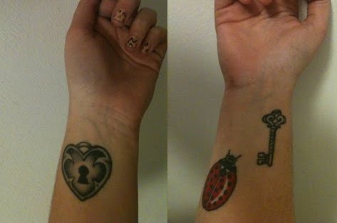 My most recent tattoos are the matching heart locket and key you can see 