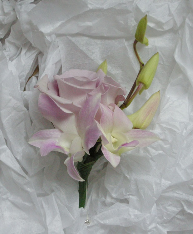 The groom 39s buttonhole a gorgeous lightly scented lilac rose called Pacific