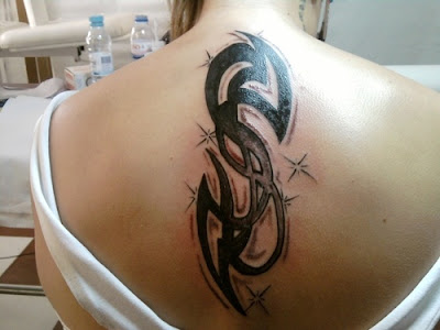 Label Simple Tribal Tattoo On Lower Back