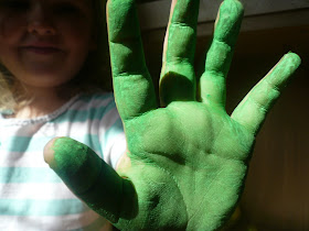 green painted child hands