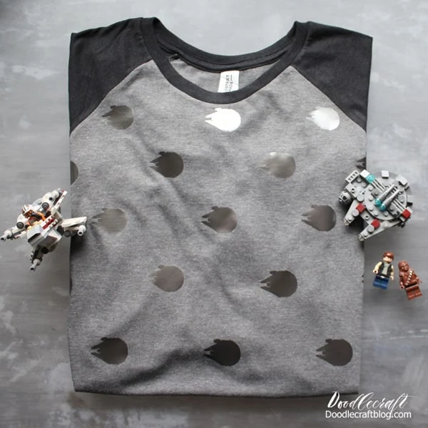 Gray and Black raglan shirt with pewter Millenium falcons all over it arranged like polka dots