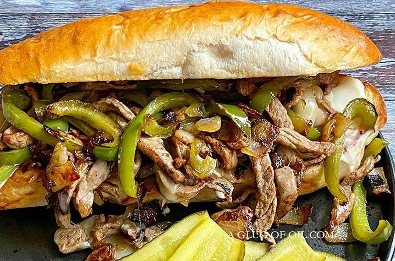 Philly cheesesteak with green peppers.