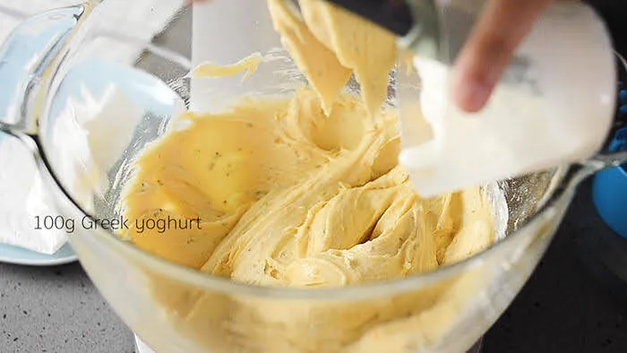 Add yoghurt to kumquat cake batter