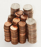 Rising stack of U.S. coins photo by Gabriel VanHelsing via Wikimedia Commons - https://commons.wikimedia.org/wiki/File:Stack_of_coins_0214(cropped).jpg