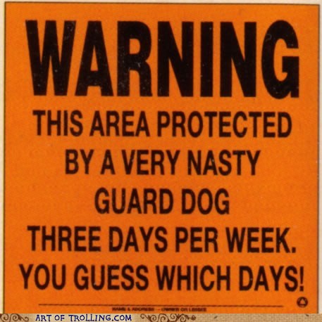 photo of a funny beware of dog poster