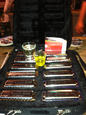 Image of a set of Marine Band harmonica's with a shot of Tequila and Pickle juice