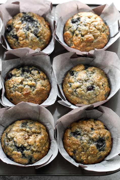These blueberry banana oatmeal muffins are made with NO butter or oil, but so soft and tender that you’d never be able to tell! Super easy to whip up in only ONE BOWL, they make a deliciously healthy breakfast or snack. No matter how much I think I’ve learned about baking over the past couple of years that I’ve