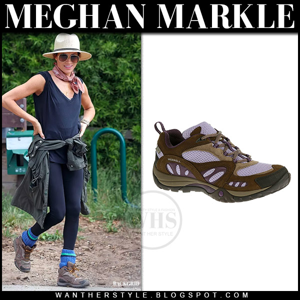 Meghan Markle in brown hiking shoes, black leggings and black top