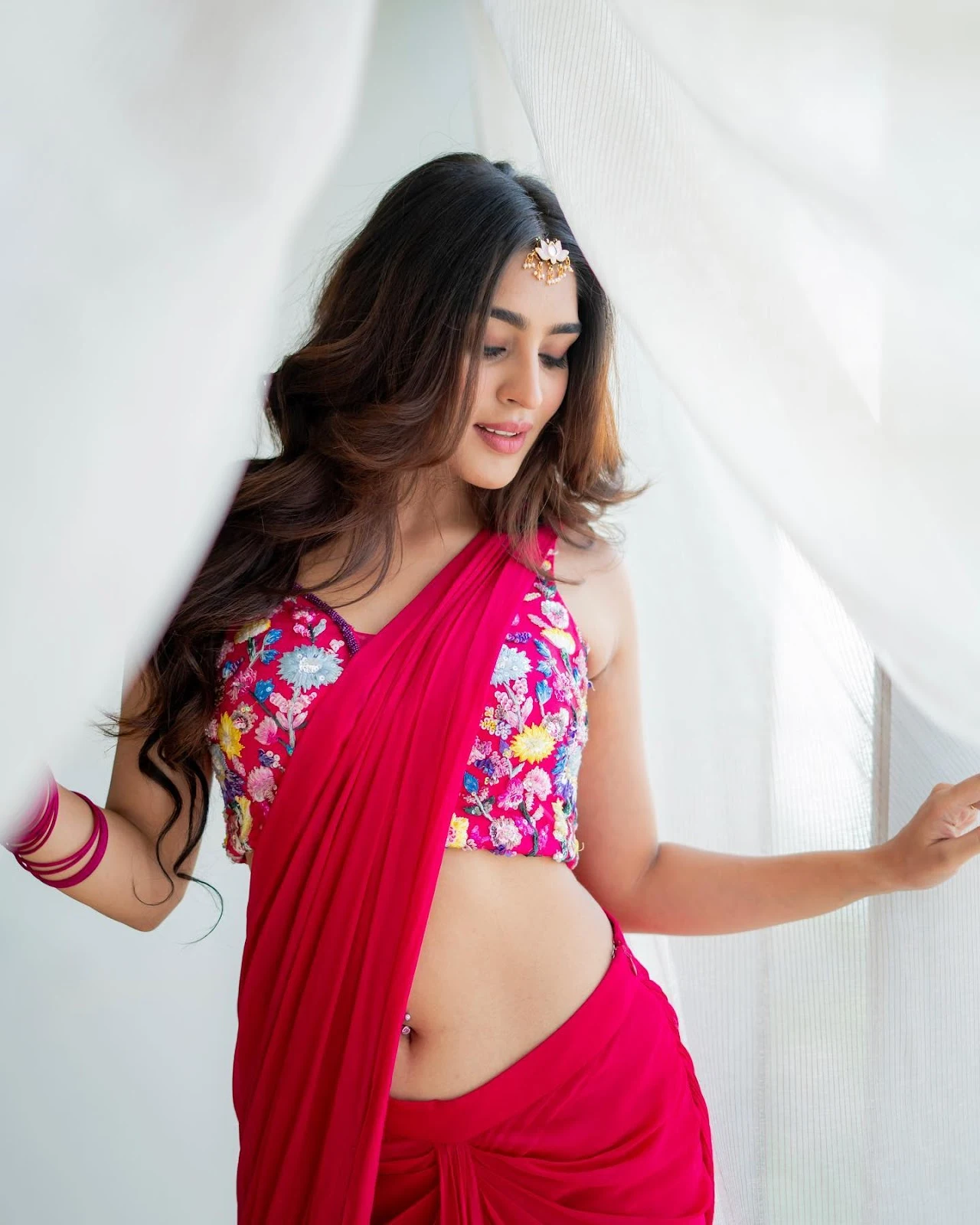 Yukti Thareja pierced navel pink saree hot actress