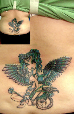 lower back fairy female tattoo 15 Women Lower Leg Tattoos