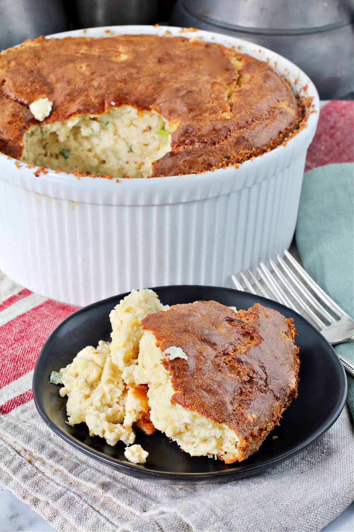 Corn Soufflé in a dish with one serving removed.