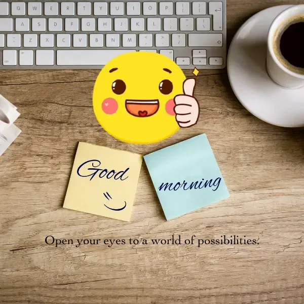 Good morning!Open your eyes to a world of possibilities.Image showing a computer keyboard a coffee cup and plate with two sticky notes mentioning good morning and a smiley emoji.