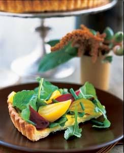 http://deliciousliving.com/recipes/goat-cheese-tart-marinated-beets-and-arugula-0