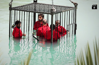 ISIS militants murdered 5 men by drowning them in a cage