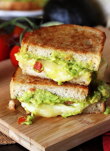 Close-Up of Melty Inside of a Guacamole Grilled Cheese Image