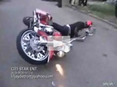 A Yong Rapper falls from the his Bike