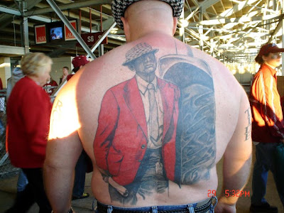 He had requested a "small, tasteful, 'Go War Eagle!'" tattoo but, arriving 