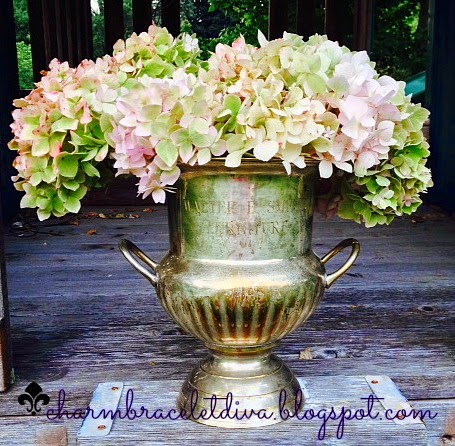 vintage silver champagne bucket with hydrangeas