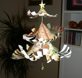 finished patterned curled paper christmas tree decoration with jingle bell