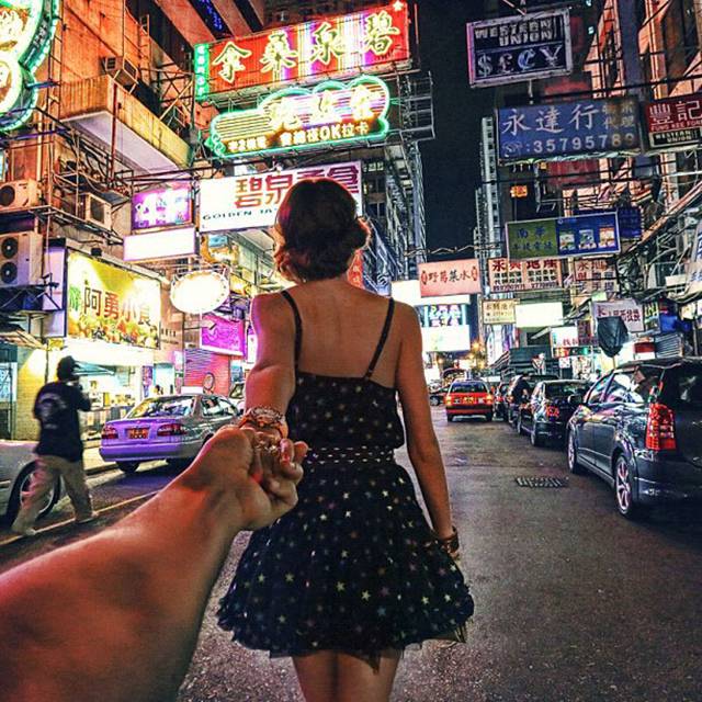 Photographer Murad Osmann creatively documents his travels around the world with his girlfriend leading the way in his ongoing series known as Follow Me To. Chronicling his adventures on Instagram, the Russian photographer composes each shot in a similar fashion. We see each landscape from the photographer's point of view with his extended hand holding onto his girlfriend's in front of him.