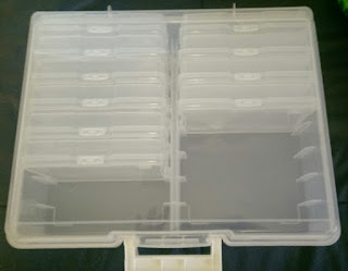 Top view of a plastic card container with labels on each card container.