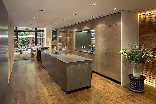 Brown modern kitchen in the Modern Townhouse With Loft Design