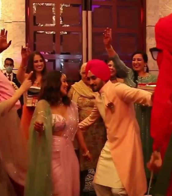 Singer Neha Kakkar and fiance RohanPreet Singh dance to dhol beats at their roka ceremony