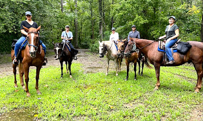 Louisiana Ladies take a break on their five-hour horseback ride.