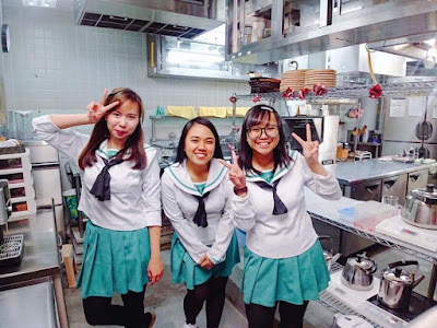 three part-timers in sailor uniforms working in a cafe in Oarai